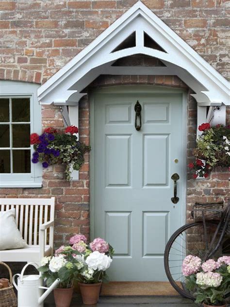Transform your porch with a front door canopy. Wooden door canopy, porch canopy | marta | Pinterest ...