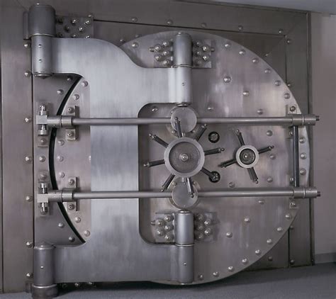 A Heavy Steel Bank Vault Door Vault Doors Banks Vault Safe Door