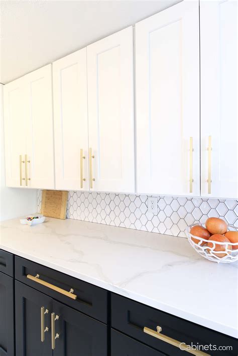 Classic Black And White Galley Kitchen With Gold Hardware