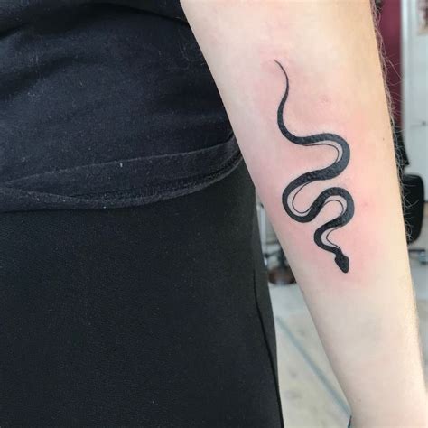 20 Simple Snake Tattoo Ideas Petpress Snake Tattoo Design Snake