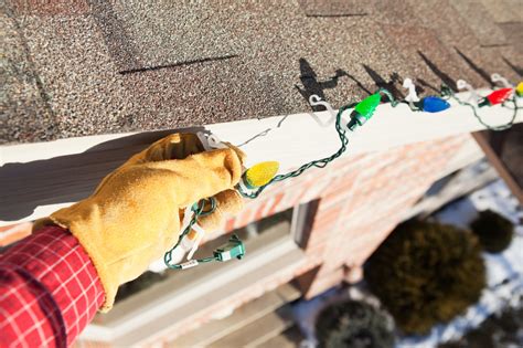 How To Hang Christmas Lights On The Roof Stadry Roofing