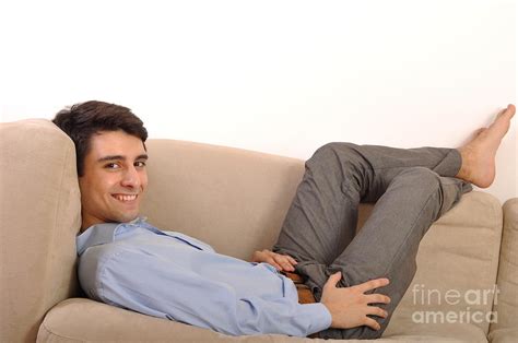 Man Relaxing On The Couch Photograph By Luis Alvarenga Fine Art America