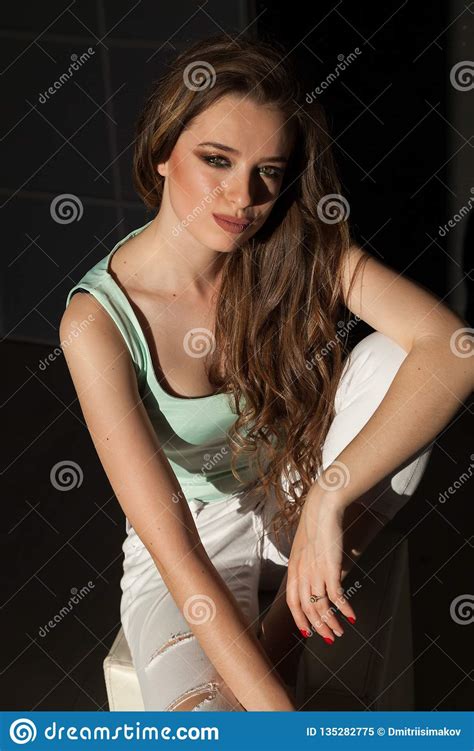 Portrait Of Beautiful Fashionable Woman In Bright Clothes Sits Stock Image Image Of City