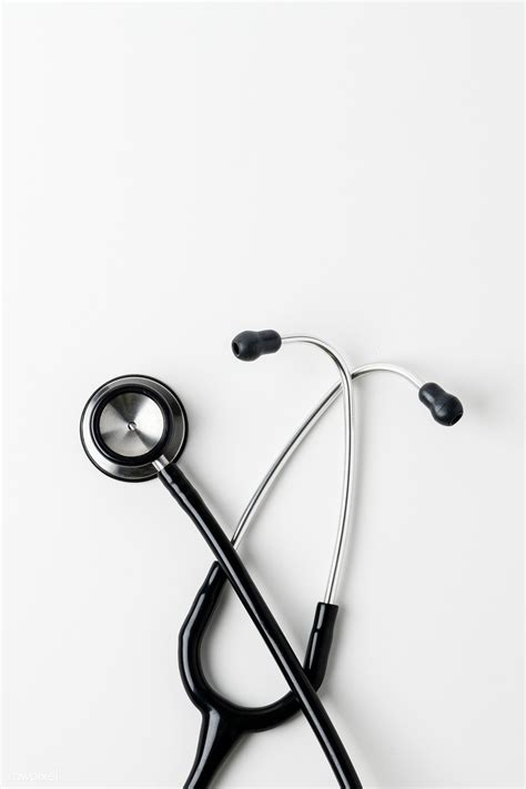 medical stethoscope on a white background free image by teddy rawpixel