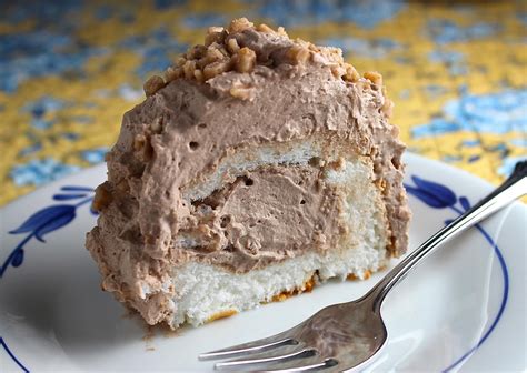 This soft, fluffy, homemade cherry angel food cake boasts a pink color from the maraschino cherries. Chocolate Toffee Filled Angel Food Cake Recipes