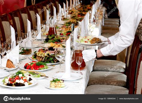 Waiter Serving Food At Luxury Table Stock Photo By ©sonyachny 138948344