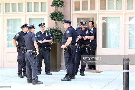 Nypd Officers On Duty Outside The Temporary Residence Of Dominique