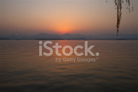 Sunset In West Lake Hangzhou China Stock Photo Royalty Free Freeimages