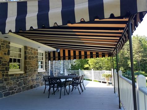 Fixed Awning Installed On A Stone Home Kreiders Canvas Service Inc