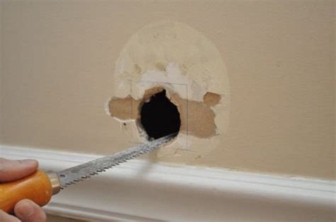 How To Patch A Hole In Your Drywall The Art Of Manliness