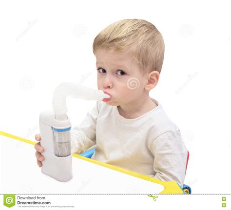 You then breathe in the spray. Boy Makes Inhalation With Ultrasonic Nebuliser Stock Photo ...