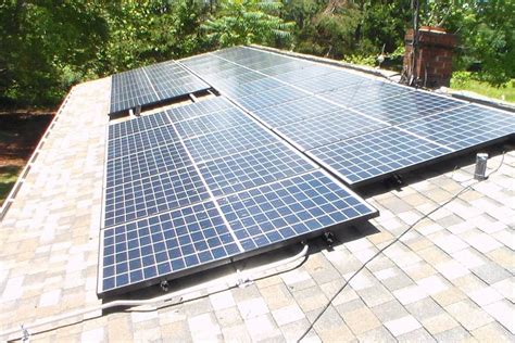 You can save a significant amount of money by cutting contractors out of the equation and take pride in your own handiwork. Roof Mount Solar Panel Installation in Elon, NC - 1 | greensolartechnologies