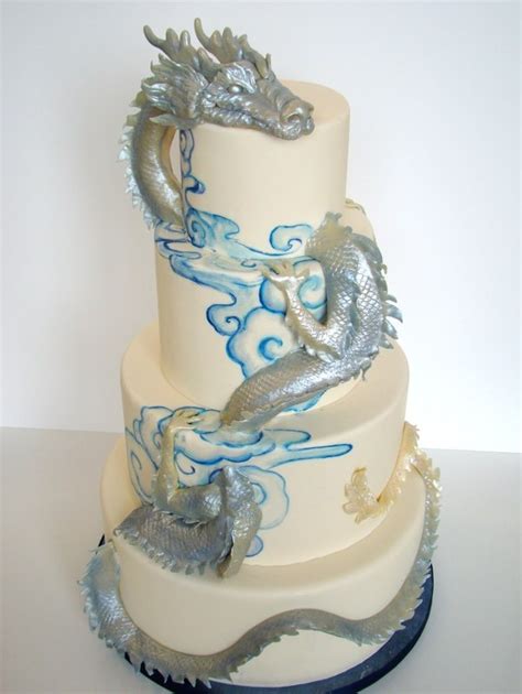 A Hand Sculpted Dragon Weaving In And Out Of The Cake By The Butter End