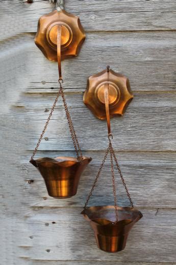 Hanging flower planters can be incorporated in most. 70s vintage copper planters collection, wall hanging ...