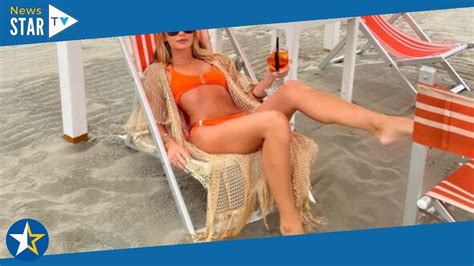 Amanda Holden Showcases Jaw Dropping Figure In Sizzling Orange Bikini