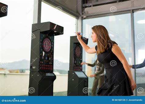 Girls Playing Darts In A Club Stock Photo Image Of Joyful Game 66160136