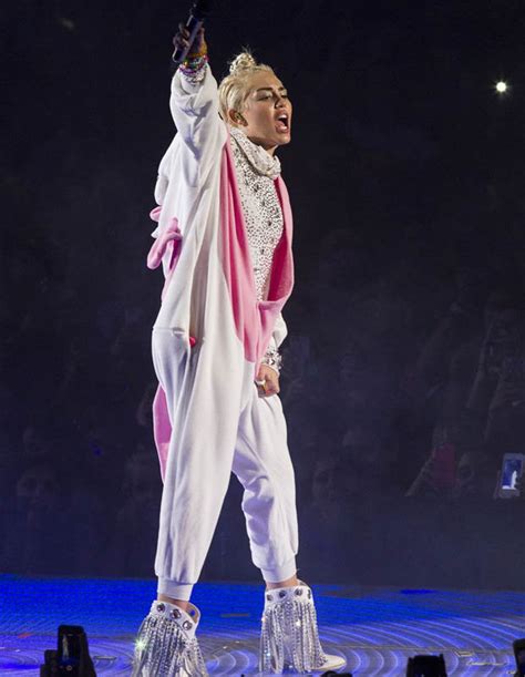 Lily Allen Shows Boobs In Unzipped Catsuit At Miley Cyrus Bangerz Gig Daily Star