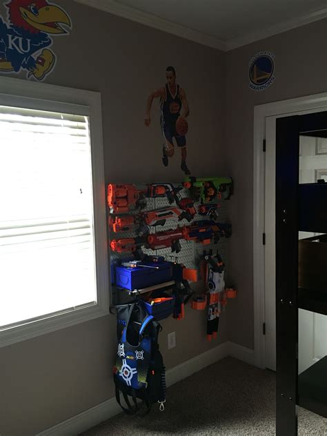 Here is a real simple diy nerf gun storage rack system for under $$20.00 bucks. Pin on Boys bedroom remodel