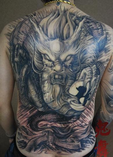 Breathtaking Very Detailed Colored Asian Evil Dragon Tattoo On Whole
