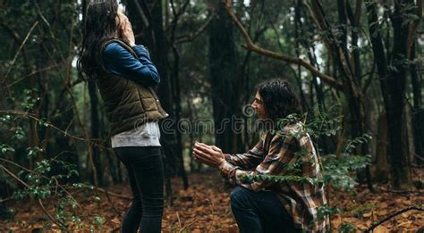 Man Proposing His Girlfriend At Forest Stock Image Image Of