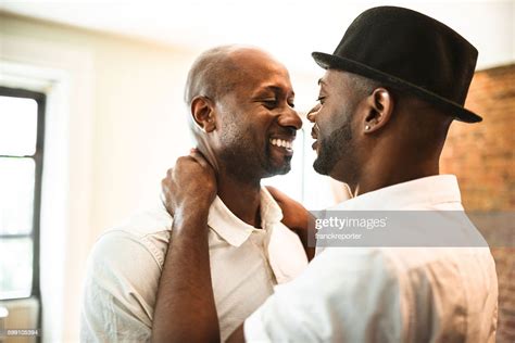Gay Couple Dancing Together At Home Photo Getty Images