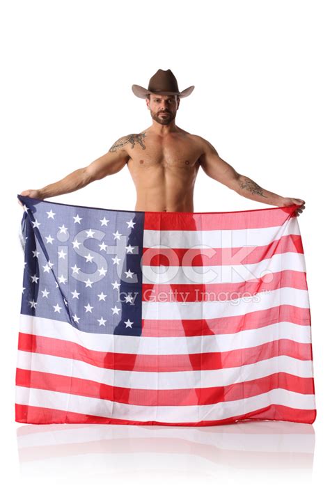 Cowboy Standing With An American Flag Stock Photo Royalty Free