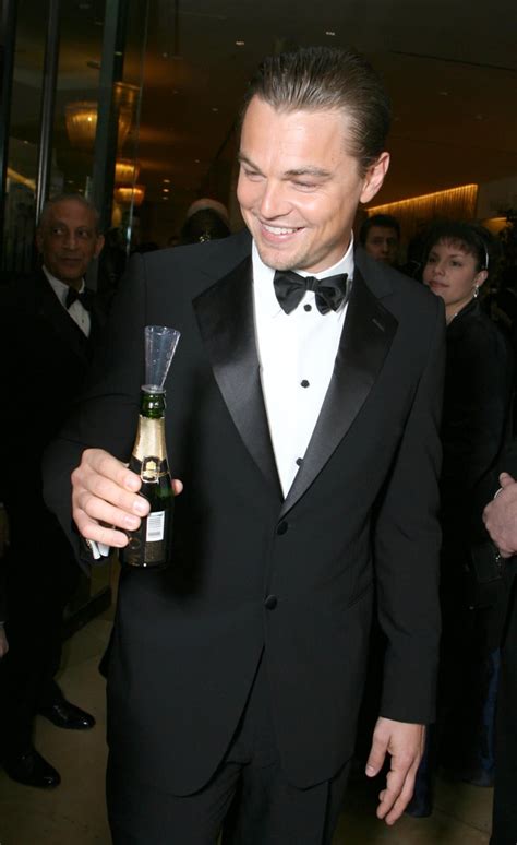 A Suited Up Leonardo Dicaprio Got Ready To Pop Some Bubbly At The