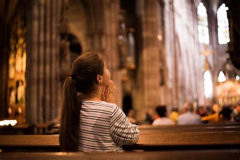 Premium Photo Young Girl Praying In Church Standing On Her Knees