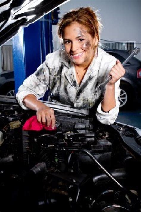 Female Mechanic Fixing A Car At The Garage Woman Mechanic Girl