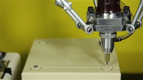 Robotic Screw Driving System With Screw Inspection For Automated