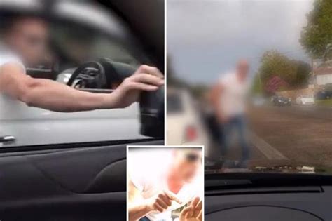 Dramatic Moment Man Driving At 40mph Punches Rear View Mirror In