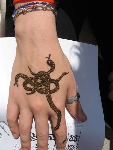 Selecting a snake for a tattoo can be exciting. Henna-snakes (With images) | Mehndi images, Henna mehndi ...