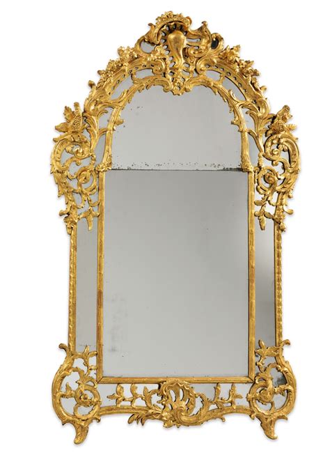 A Carved Giltwood Mirror Louis Xv Circa 1740 Miroir À Parcloses En