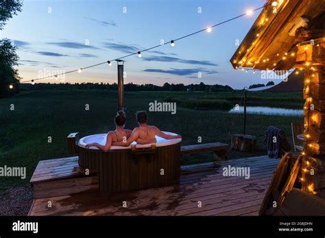 Young Couple Enjoy Outside Ofuro Japanese Hot Tub In Romantic Environment Idyllic Bathtub In