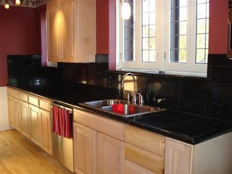 Typically, granite tiles fit together more snugly than ceramic tiles. Black Ceramic Tile Countertops | Kitchen design ...