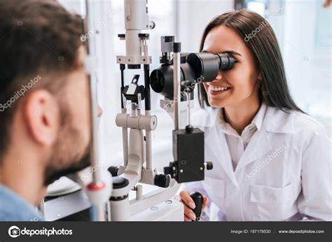 Doctor And Patient In Ophthalmology Clinic Stock Photo By ©4pmphoto