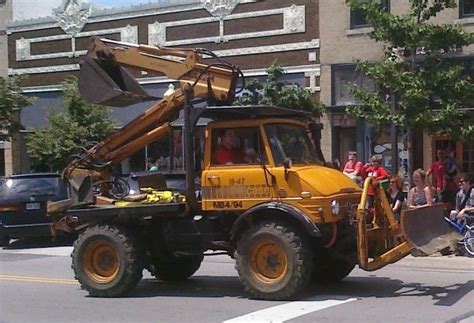 Unimog With Backhoe And Front Blade Assembly Fahrzeuge Technische