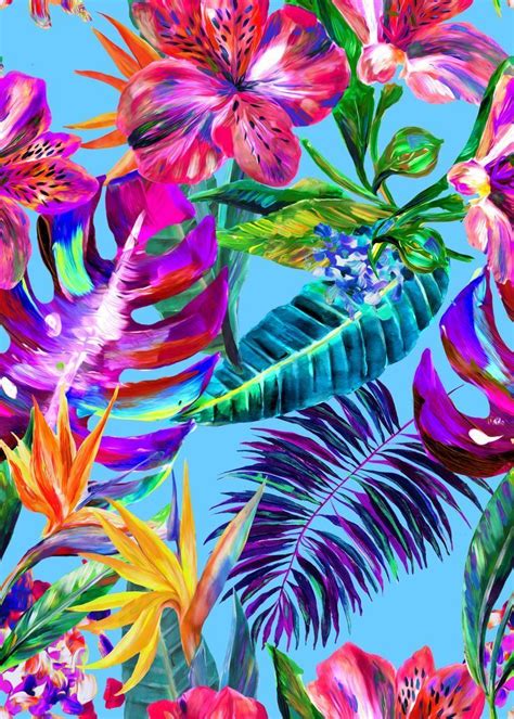 Colorful Tropical Flowers And Palm Leaves On A Blue Sky Background