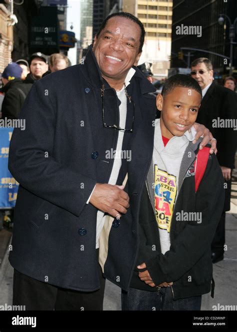 mar 25 2008 new york ny usa comedian john witherspoon poses for photos with his son at