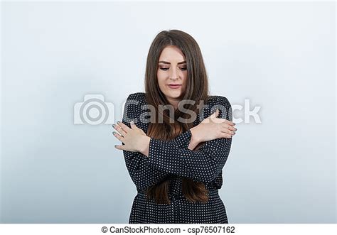Young Caucasian Woman Hugging Herself Cold Shivering Looking At Camera Young Caucasian Woman