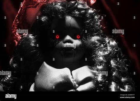 Horror Photo Of Scary Demon Possessed Plastic Doll With Glowing Red