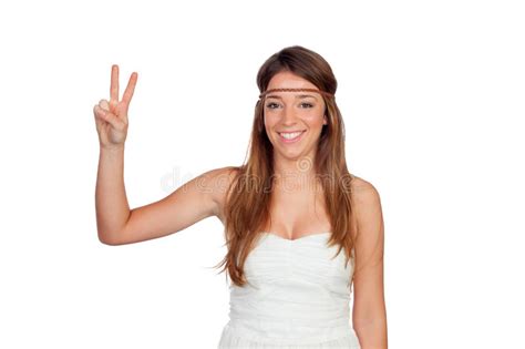 Pretty Girl With Hippie Clothes Making The Peace Symbol