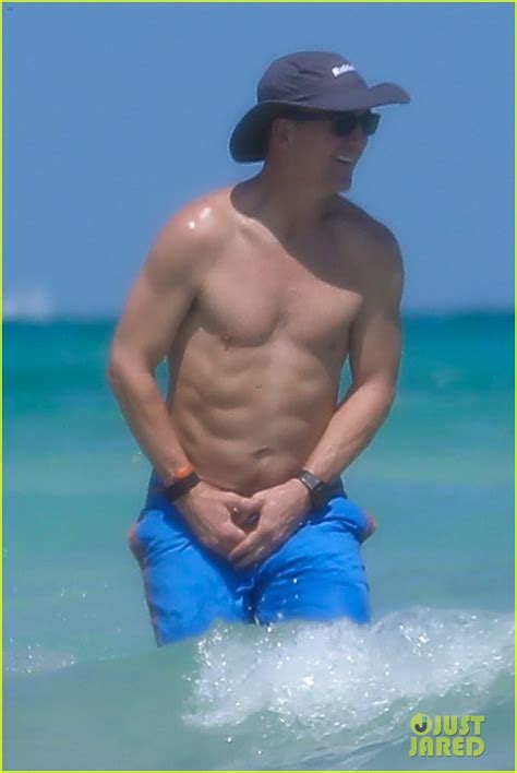 peyton manning flaunts ripped abs while shirtless at the beach photos photo 4492978 bikini