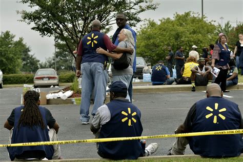 The Latest: Suspect in Walmart shooting showed knife at work