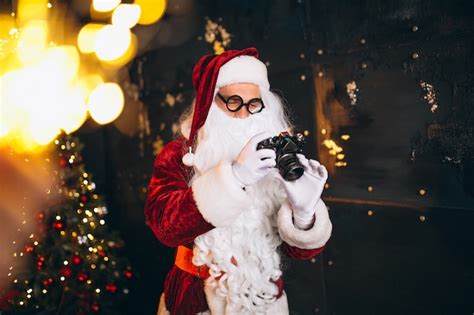 Free Photo Santa Claus Making Photos On Camera