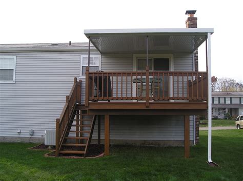 Aluminum awnings have tackled the outdoor elements for many years before fabric awnings became more mainstream. Flat Pan Aluminum Awning | Aluminum awnings, Entry doors ...