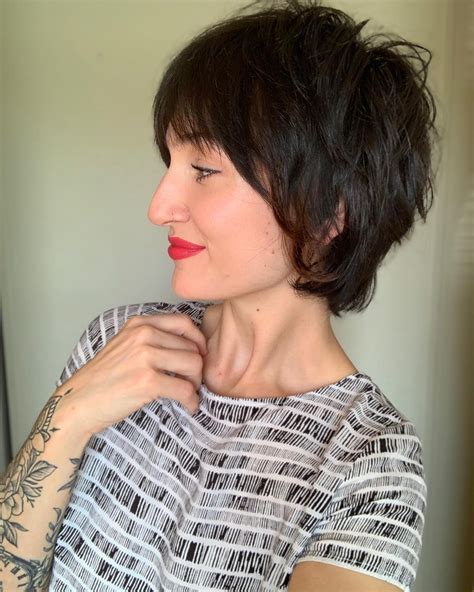 Curtain haircuts from the 90's are trending and back in style. 23 Short Hair with Bangs Hairstyle Ideas (Photos Included)
