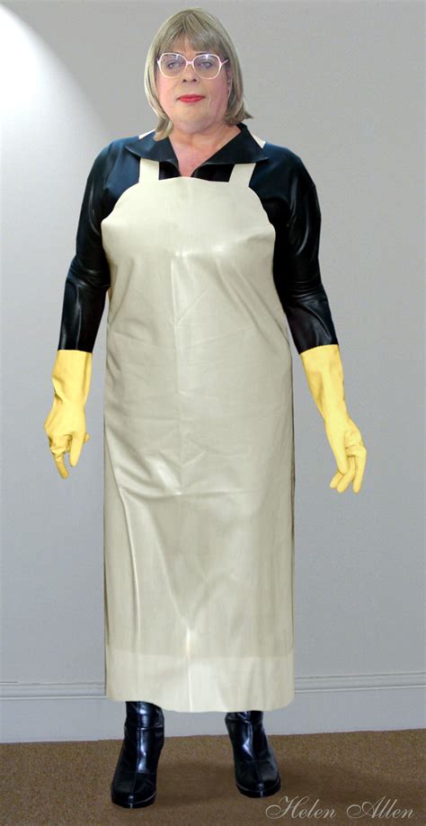 A Woman Dressed In An Apron And Rubber Gloves