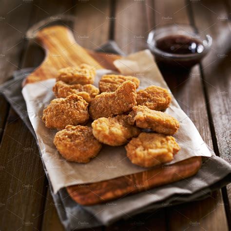 Find images of chicken nuggets. crispy chicken nuggets ~ Food & Drink Photos ~ Creative Market