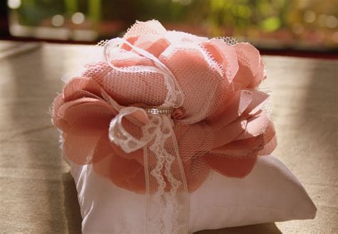 If you'd like to make realistic looking flowers, use colored materials and arrange the petals so they look natural. {Bridal DIY} Tulle & Chiffon Fabric Flower Tutorial